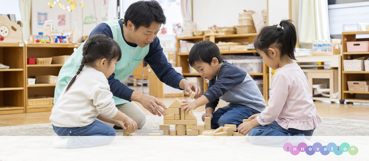 AIで作成した画像。実在の施設・職員ではありません（保育士・ブロック遊びの場面）